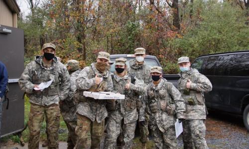 Cadets enjoying pizza following a land navigation course
